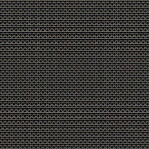 Close-up view of a Straight Drop Blind showcasing a textured pattern with small, repeating interlocking shapes in shades of black and gray.