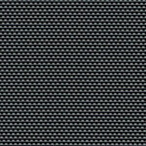 The Straight Drop Blind features a pattern of small, repetitive black and white shapes that gives the image a textured appearance.