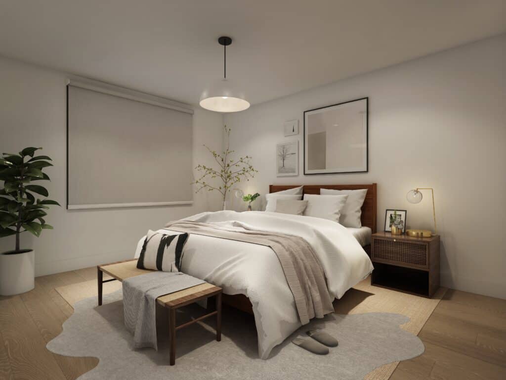 Modern bedroom with a neatly made bed, two nightstands, a bench at the foot, and a plant in the corner. Artworks are on the wall above the bed, and a ceiling lamp hangs centrally.