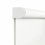 Close-up of a white roller window blind with a rounded top casing, shown partially unrolled against a plain white background.