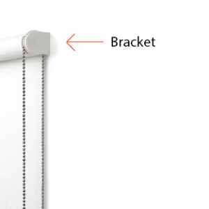Close-up of a Builders' Range Roller Blinds with a metal bead chain; an arrow highlights the wall-mounted bracket at the left end.